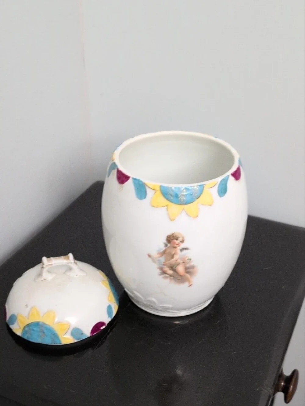 Porcelain Cherub Decorative Jar in White with Yellow & Blue Accents